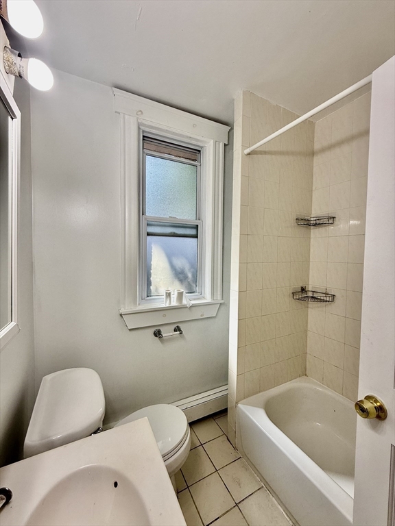62 Algonquin Road, Unit 2 Newton, MA 02467 - Photo 33 of 38 a bathroom with a toilet and a bathtub