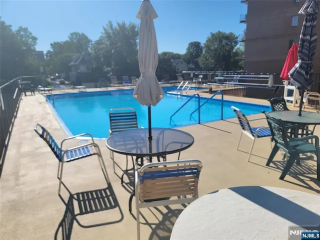 a view of a chairs and tables in the patio