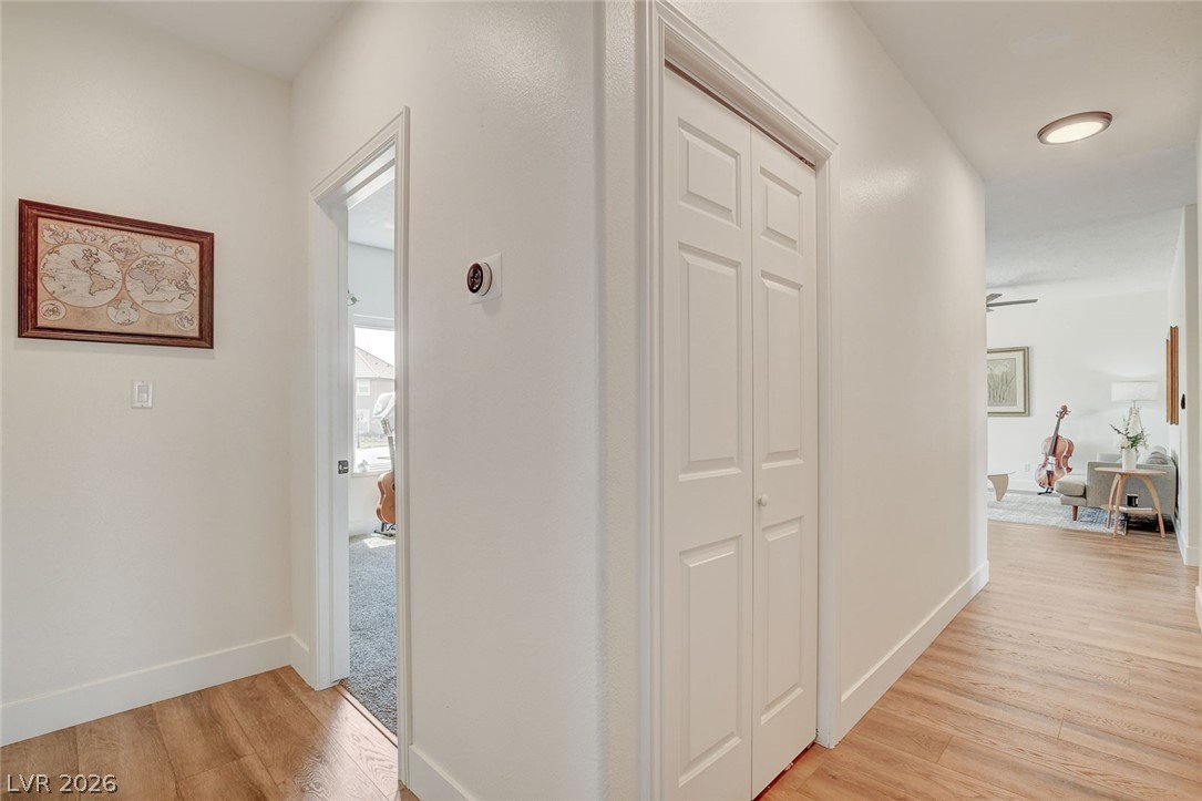 4362 Thistle Street Logandale, NV 89021 - Photo 39 of 99 A welcoming entryway with warm wood flooring opens to an inviting living space.