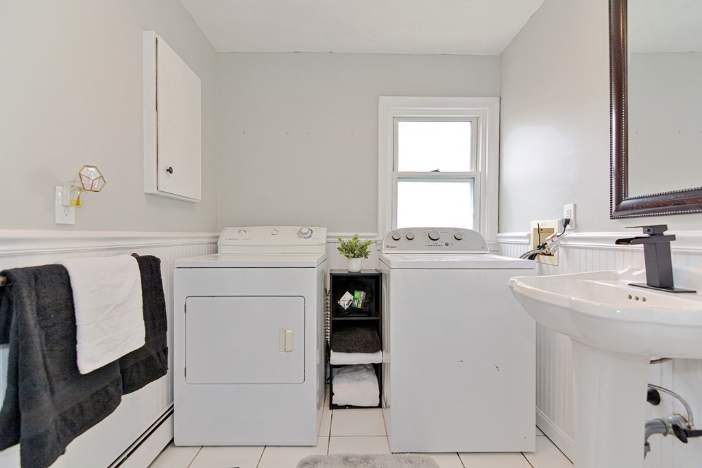 9 Doane Road Medford, MA 02155 - Photo 14 of 28 a utility room with dryer and washer