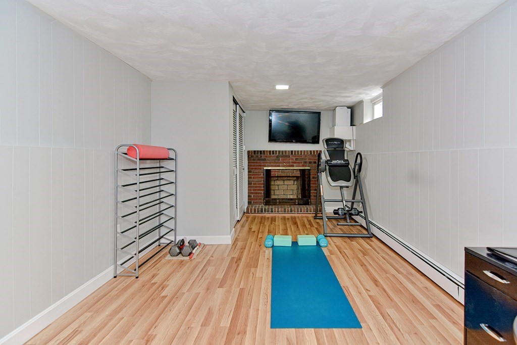 9 Doane Road Medford, MA 02155 - Photo 23 of 28 a view of a room with wooden floor and furniture