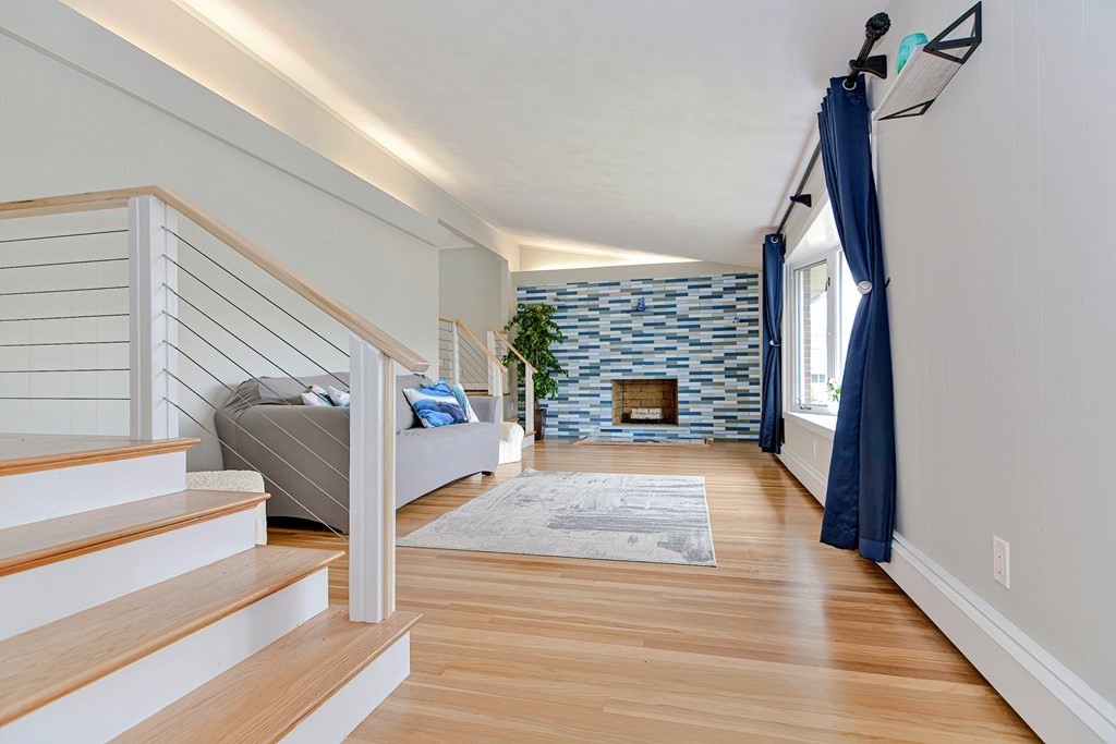 9 Doane Road Medford, MA 02155 - Photo 5 of 28 a view of entryway livingroom and hall