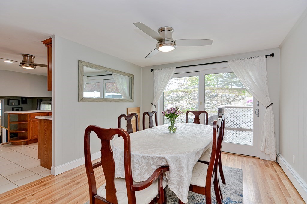 9 Doane Road Medford, MA 02155 - Photo 7 of 28 a view of a dining room with furniture window and wooden floor