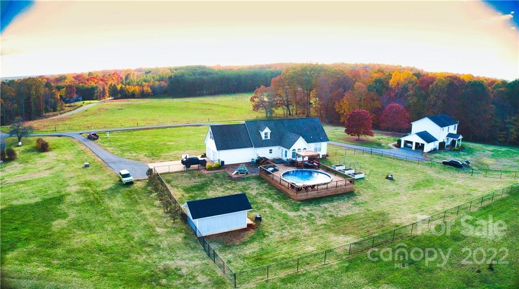 565 Salem Church Road Bostic, NC 28018 - Photo 4 of 44 a view of a golf course with chairs
