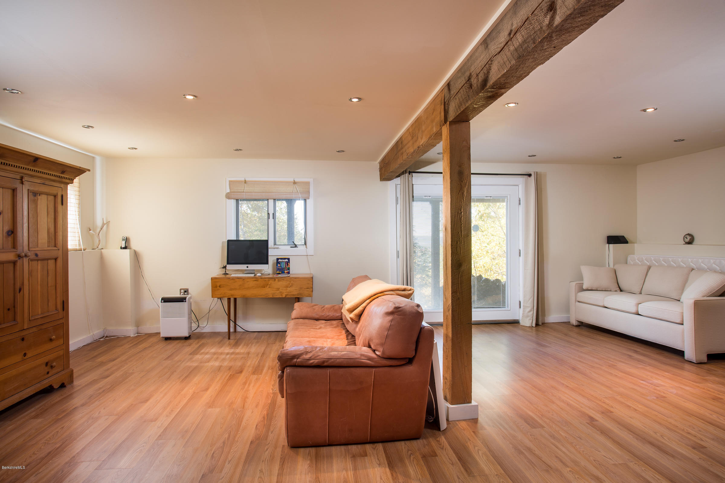 116 Hupi Road Monterey, MA 01245 - Photo 15 of 17 a living room with furniture and a wooden floor