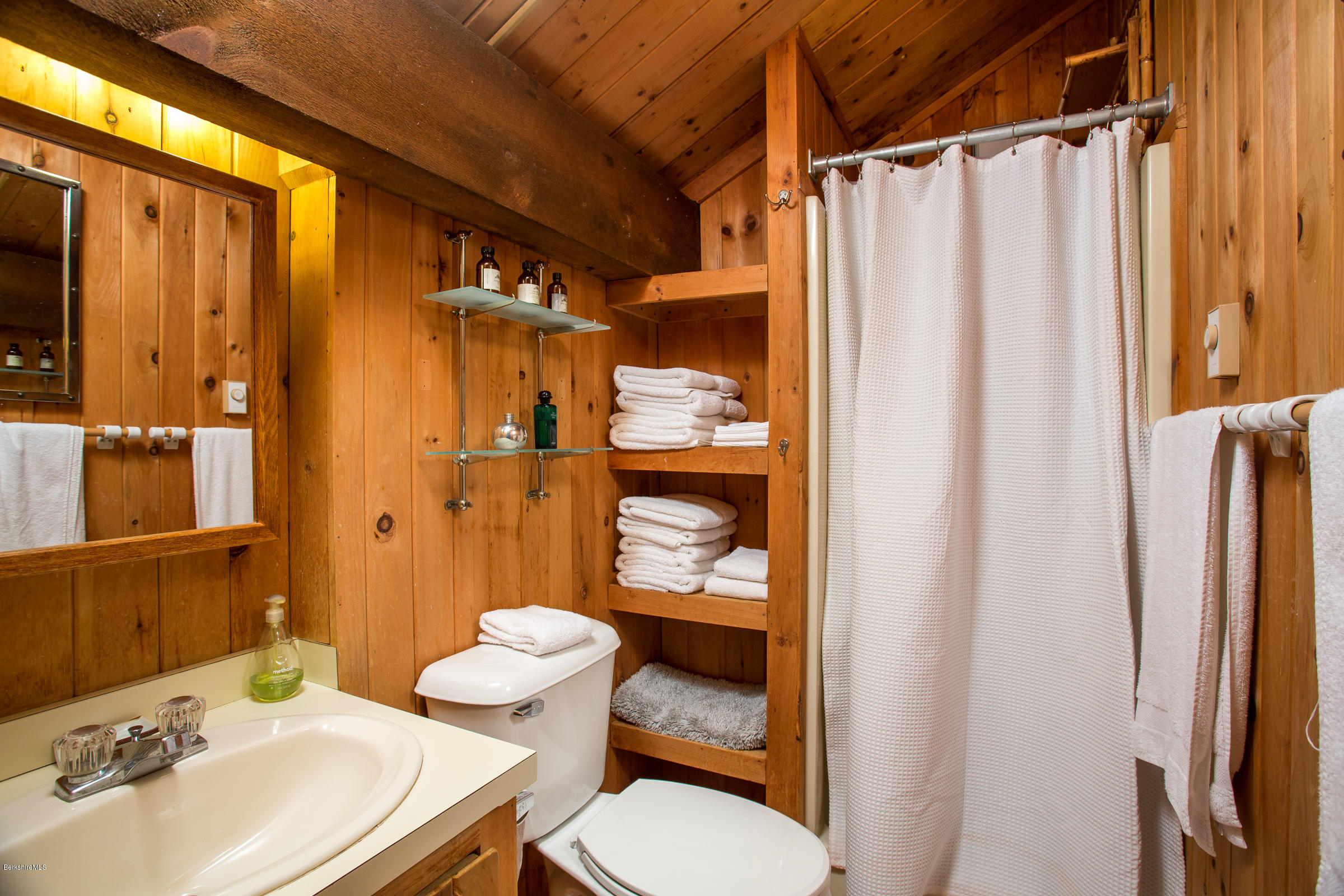 116 Hupi Road Monterey, MA 01245 - Photo 9 of 17 a bathroom with a sink toilet and shower