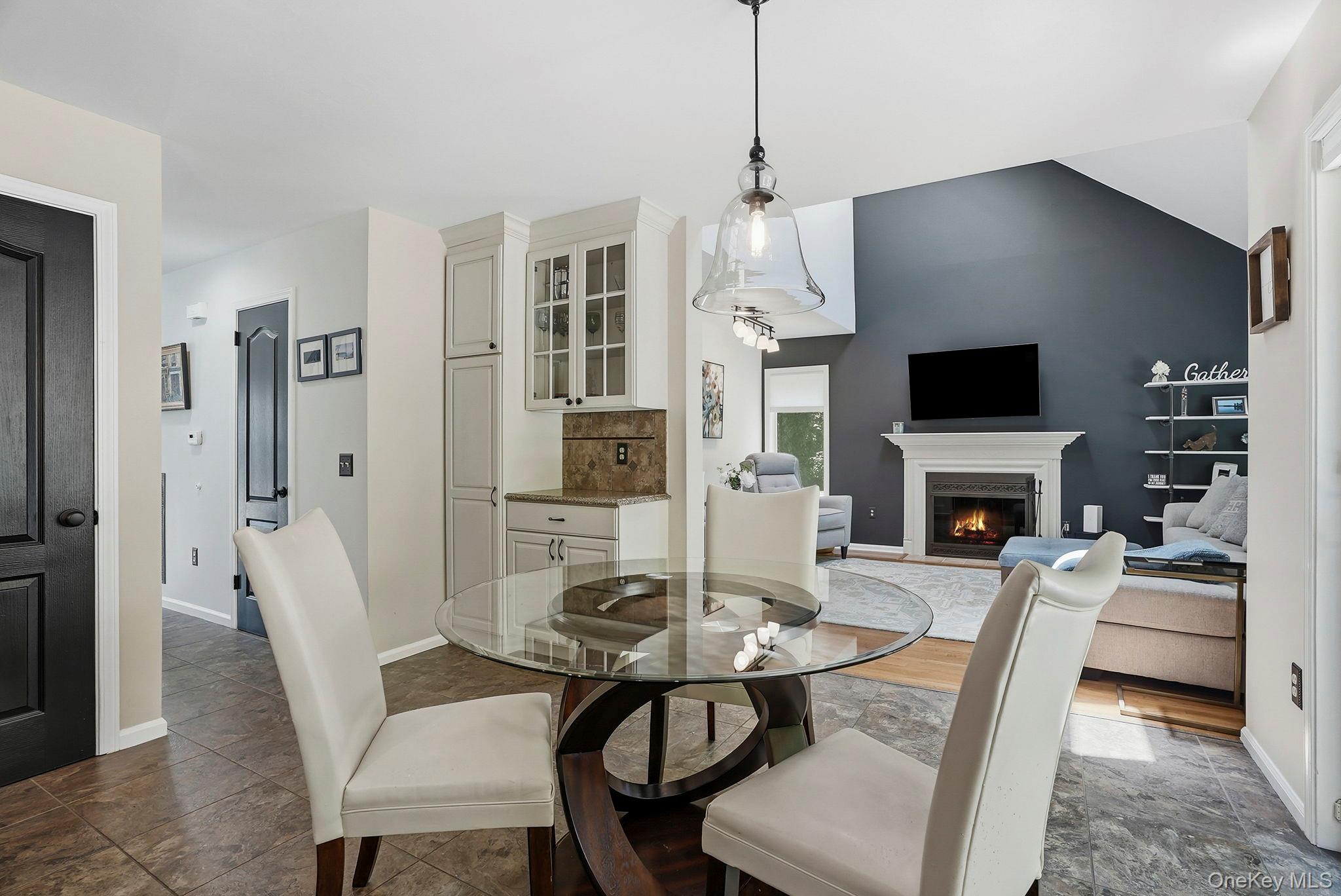 31 Ridge Road Cortlandt Manor, NY 10567 - Photo 11 of 39 The generously sized eat-in kitchen opens to the family room.