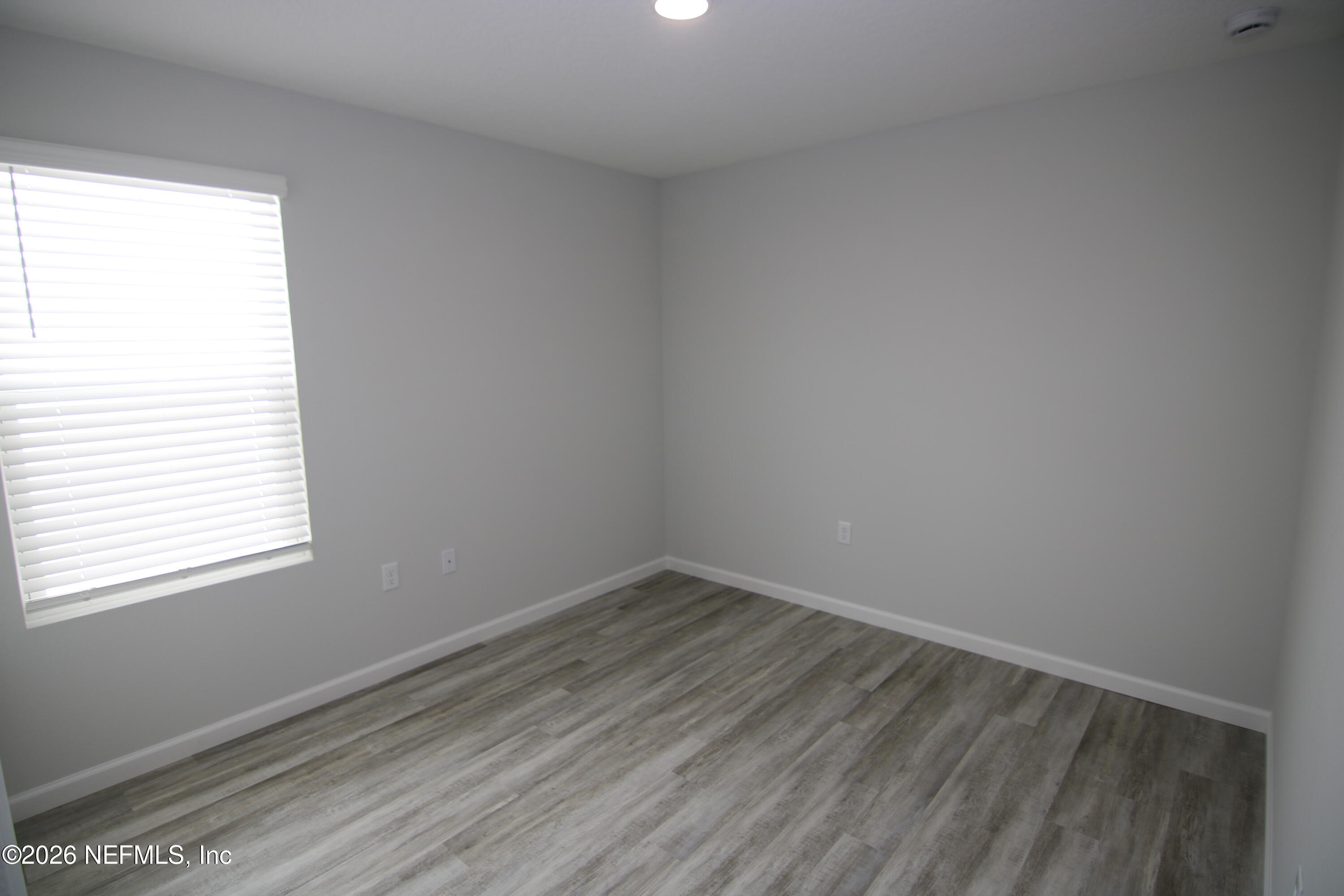 853 Jackson Road Jacksonville, FL 32225 - Photo 12 of 18 an empty room with a window