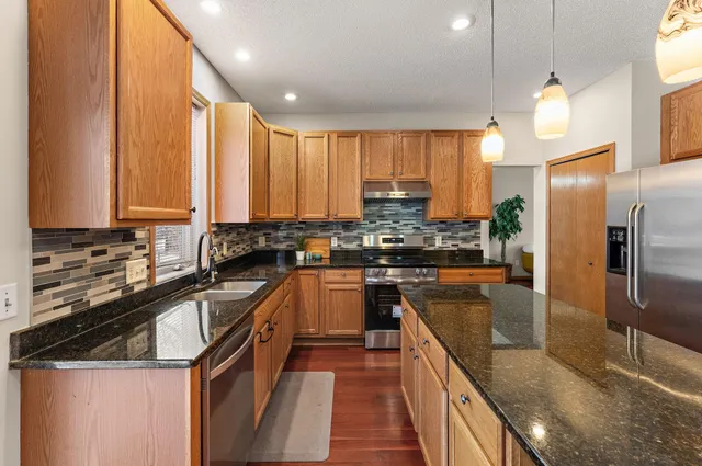 $567,700 | 2430 Golf Drive, Woodbury, MN 55129