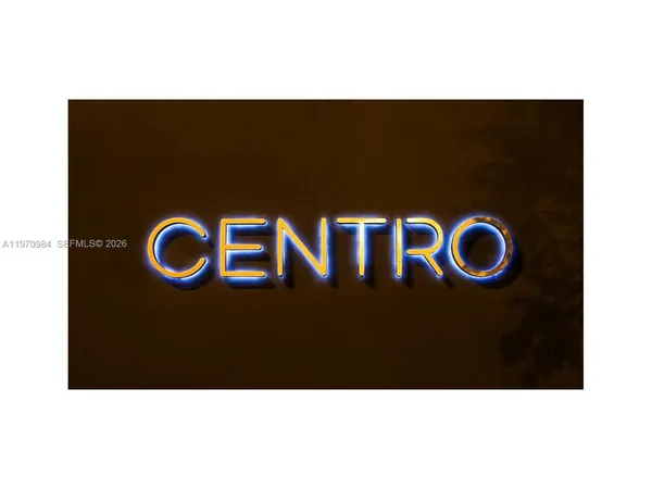 a view of an empty room with furniture