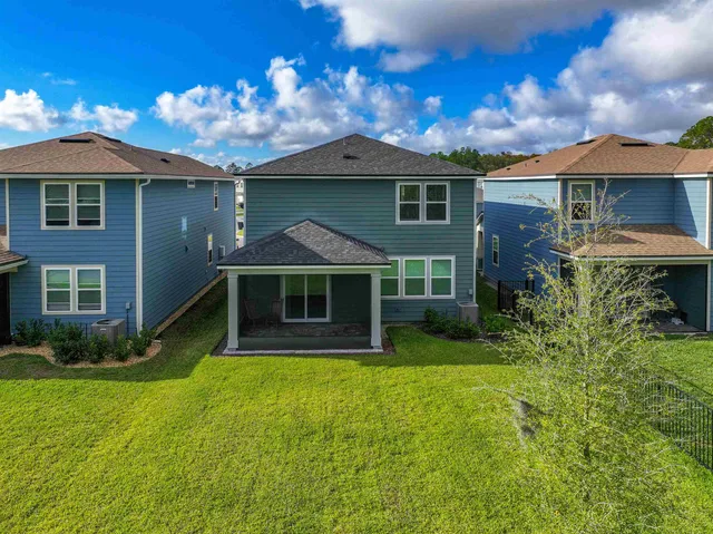 a view of an ocean with a swimming pool