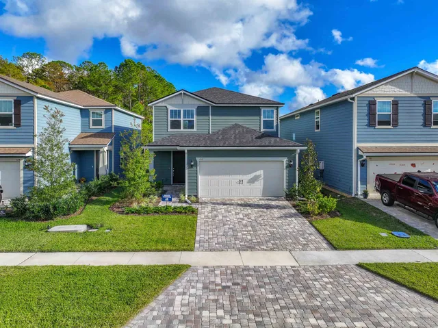 an aerial view of multiple house