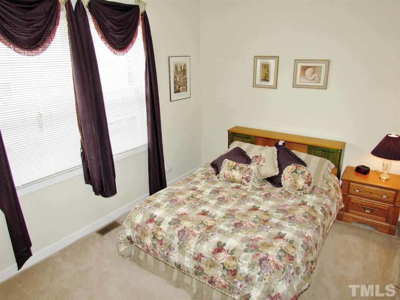 2905 Witterton Place Raleigh, NC 27614 - Photo 9 of 25 Downstairs bedroom - perfect for guests with the full bathroom right outside the room.