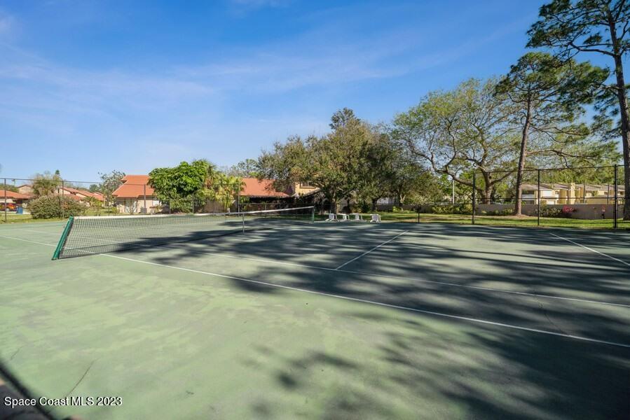 1638 Dawes Road Northeast Palm Bay, FL 32905 - Photo 19 of 26 a view of grassy field with trees