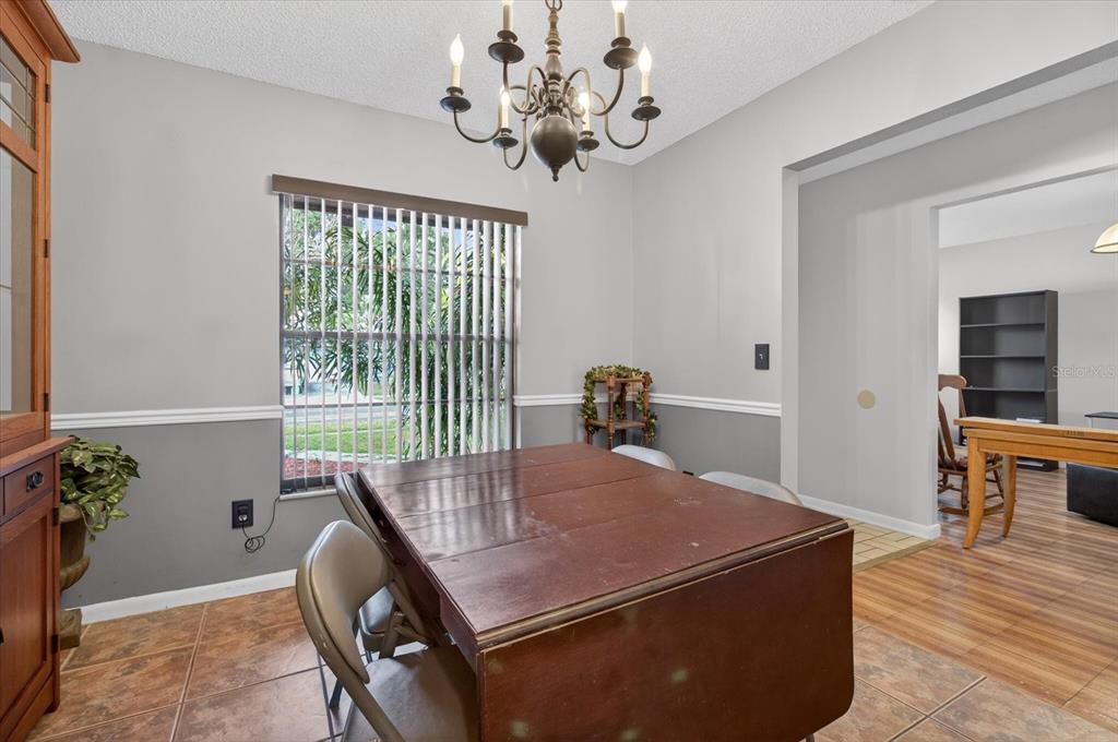 750 Caliente Drive Brandon, FL 33511 - Photo 23 of 71 a dining room with furniture and window