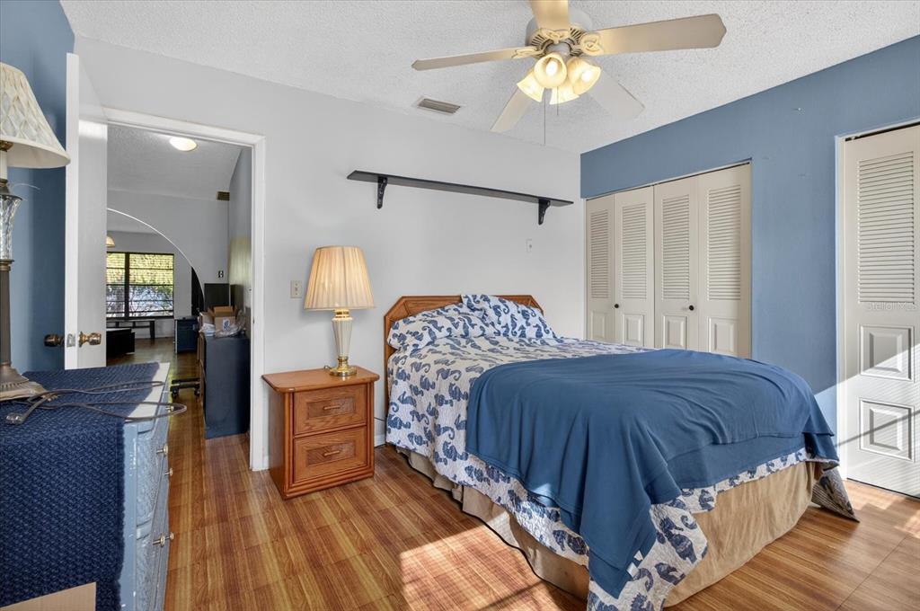 750 Caliente Drive Brandon, FL 33511 - Photo 35 of 71 a bedroom with a bed mirror and a window