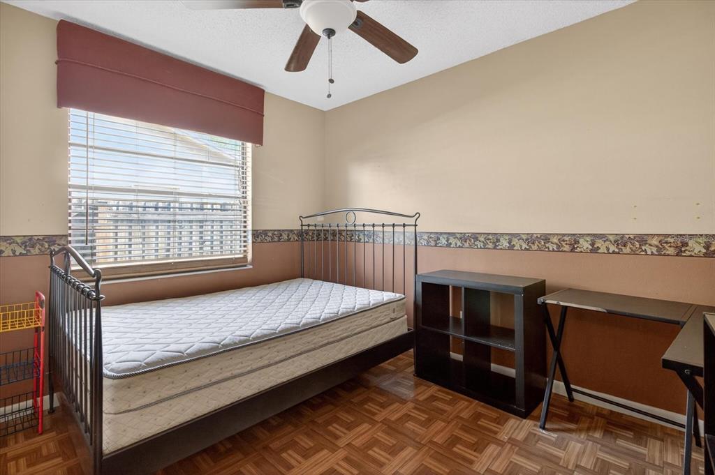 750 Caliente Drive Brandon, FL 33511 - Photo 37 of 71 a bedroom with a bed and a dresser