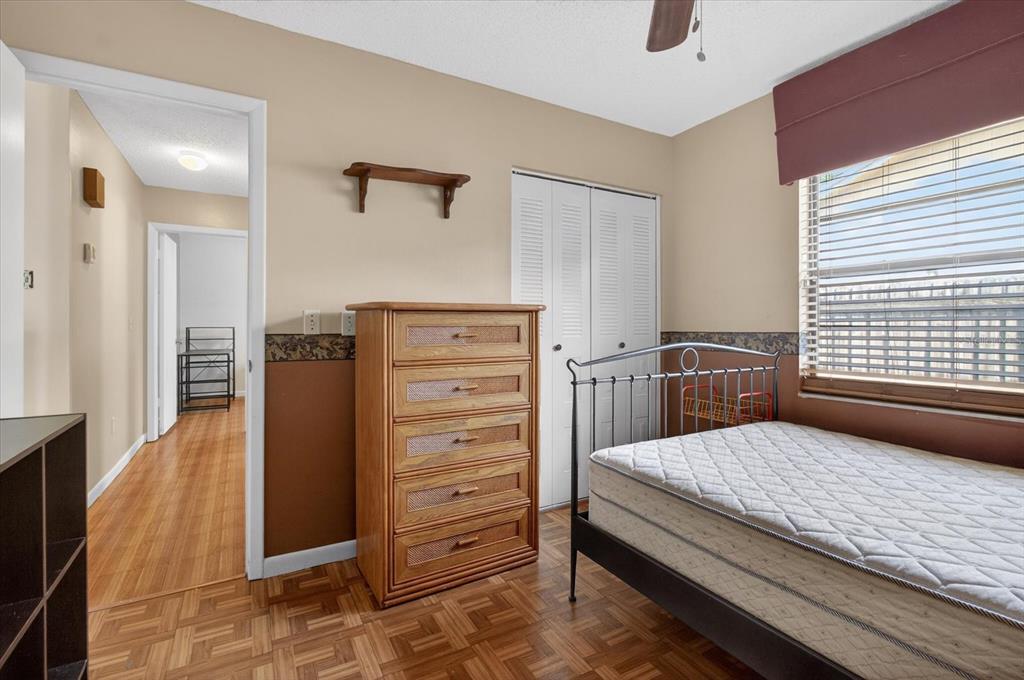 750 Caliente Drive Brandon, FL 33511 - Photo 38 of 71 a bedroom with a dresser and a window