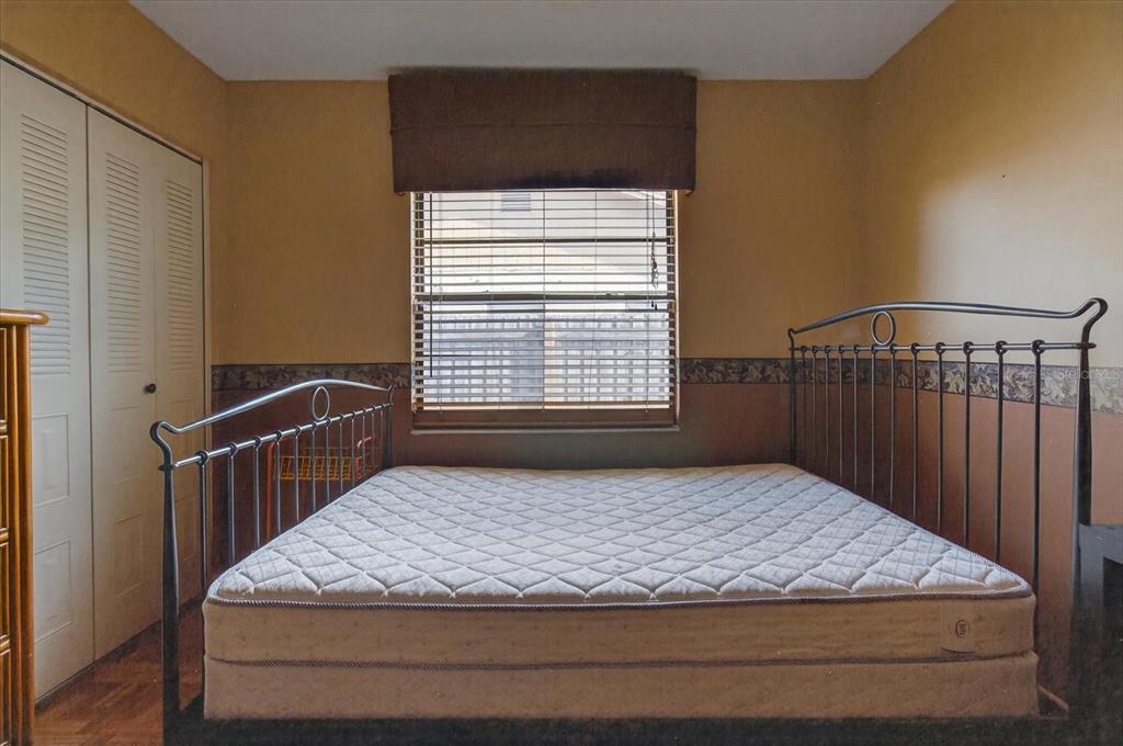 750 Caliente Drive Brandon, FL 33511 - Photo 39 of 71 a bedroom with a bed and window