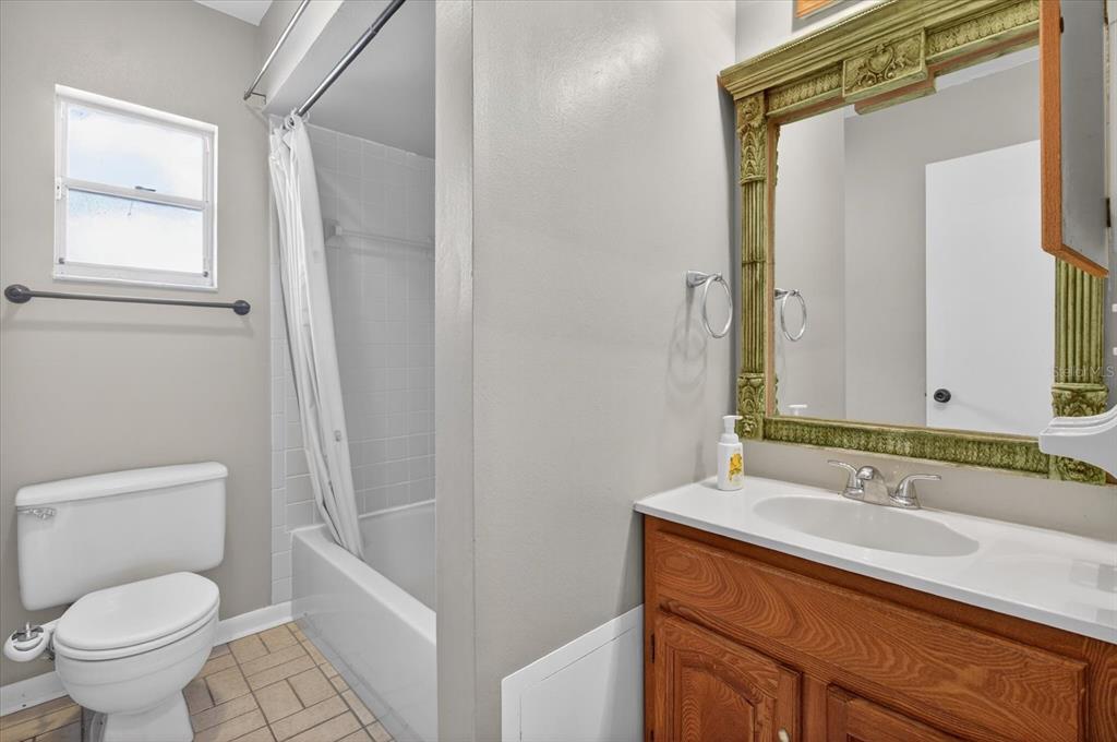 750 Caliente Drive Brandon, FL 33511 - Photo 40 of 71 a bathroom with a granite countertop sink toilet and shower