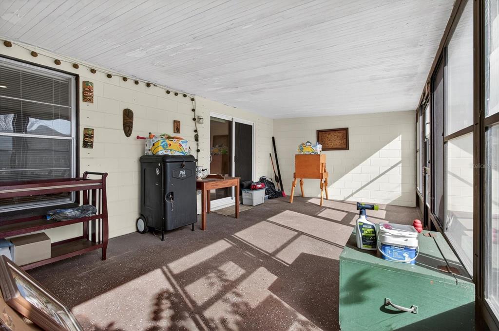 750 Caliente Drive Brandon, FL 33511 - Photo 48 of 71 a living room with furniture and a flat screen tv