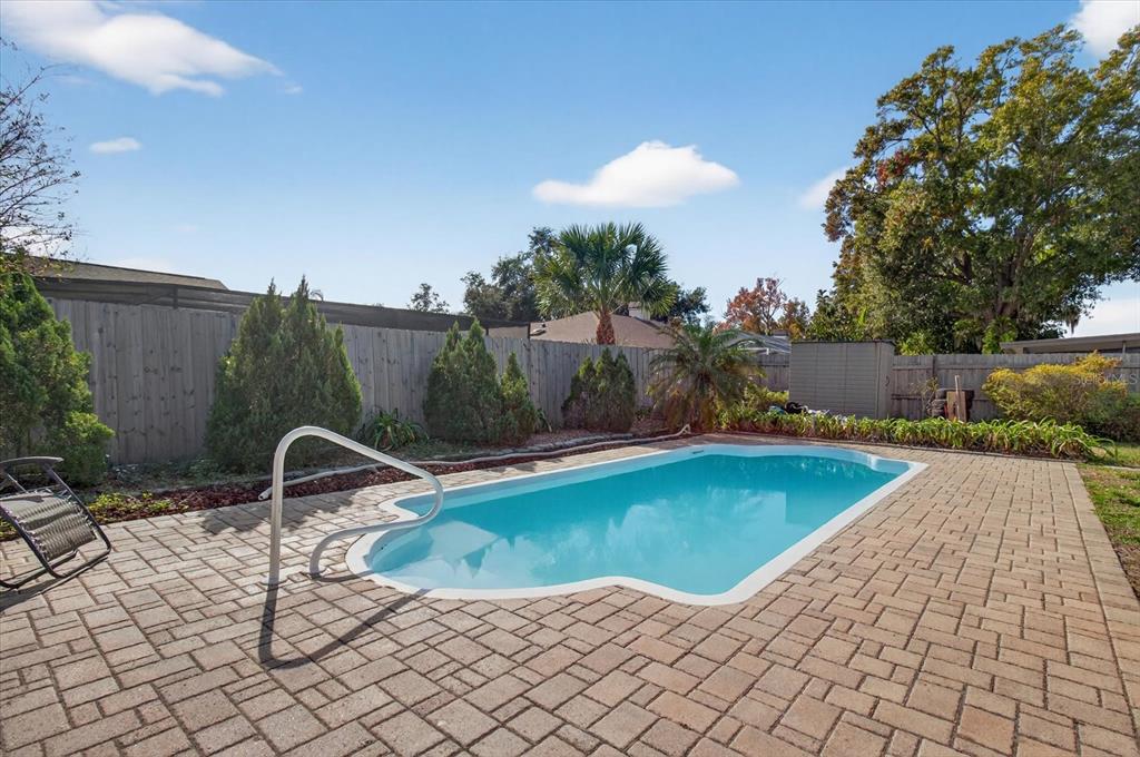 750 Caliente Drive Brandon, FL 33511 - Photo 53 of 71 a view of a swimming pool with a patio