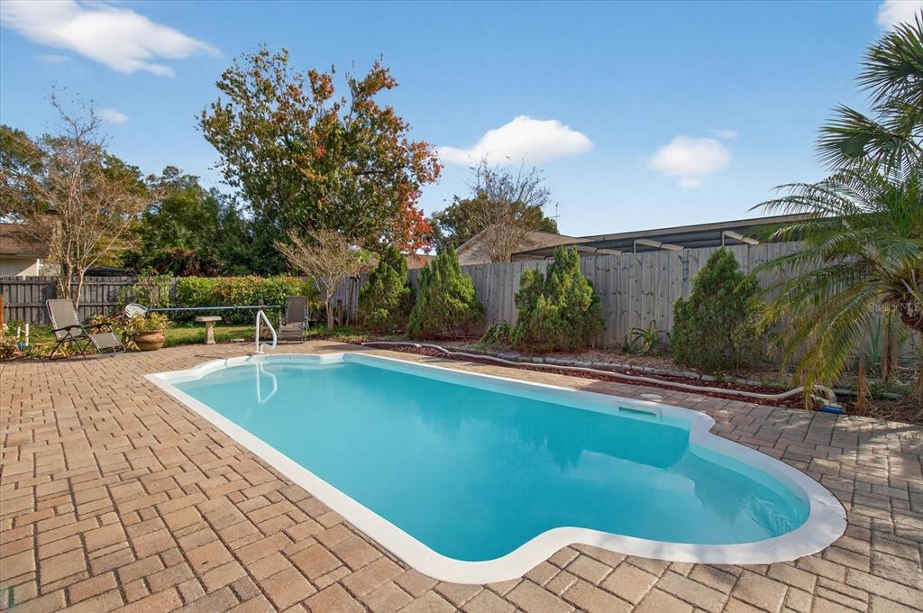750 Caliente Drive Brandon, FL 33511 - Photo 54 of 71 a view of a swimming pool with a patio
