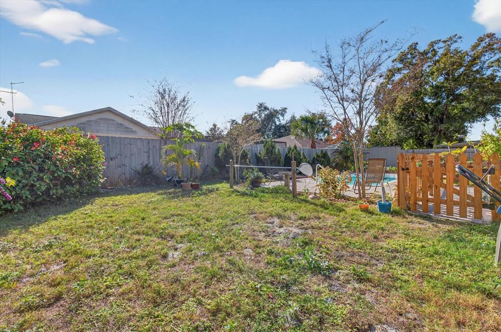 750 Caliente Drive Brandon, FL 33511 - Photo 61 of 71 a backyard of a house with lots of green space