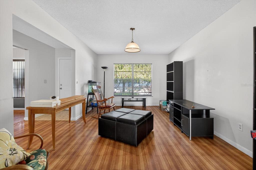 750 Caliente Drive Brandon, FL 33511 - Photo 9 of 71 a living room with furniture windows and wooden floor