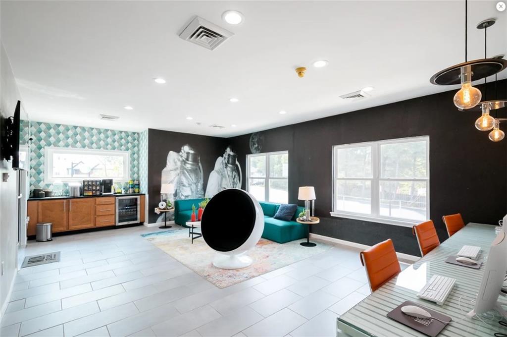 916 Beaver Grade Road Coraopolis, PA 15108 - Photo 13 of 17 a living room with furniture and a flat screen tv