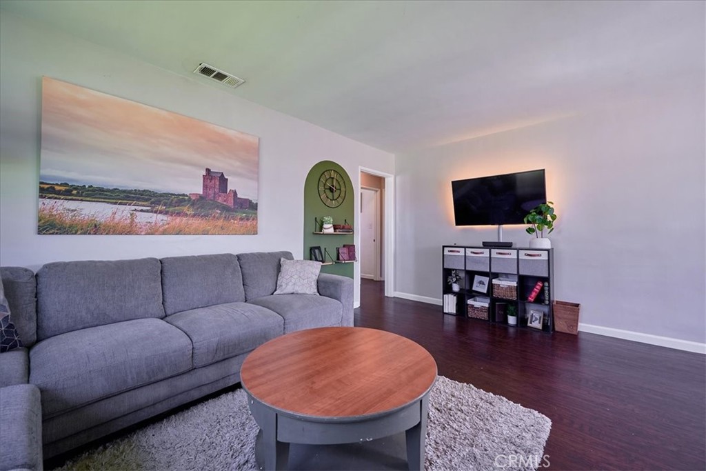 3469 Verde Street Riverside, CA 92504 - Photo 11 of 38 a living room with furniture and a flat screen tv