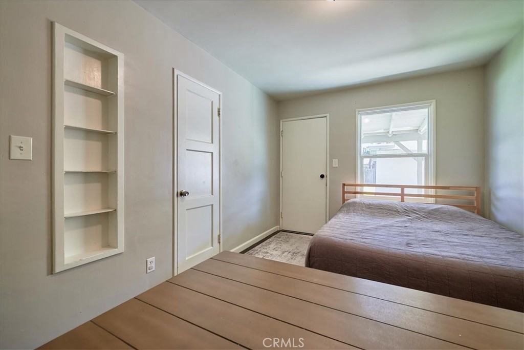 3469 Verde Street Riverside, CA 92504 - Photo 27 of 38 a bedroom with a bed and a window
