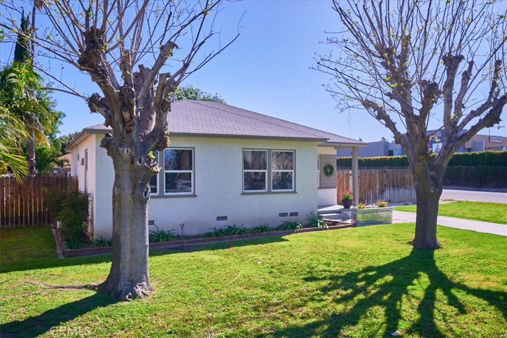 3469 Verde Street Riverside, CA 92504 - Photo 3 of 38 a front view of house with yard and green space