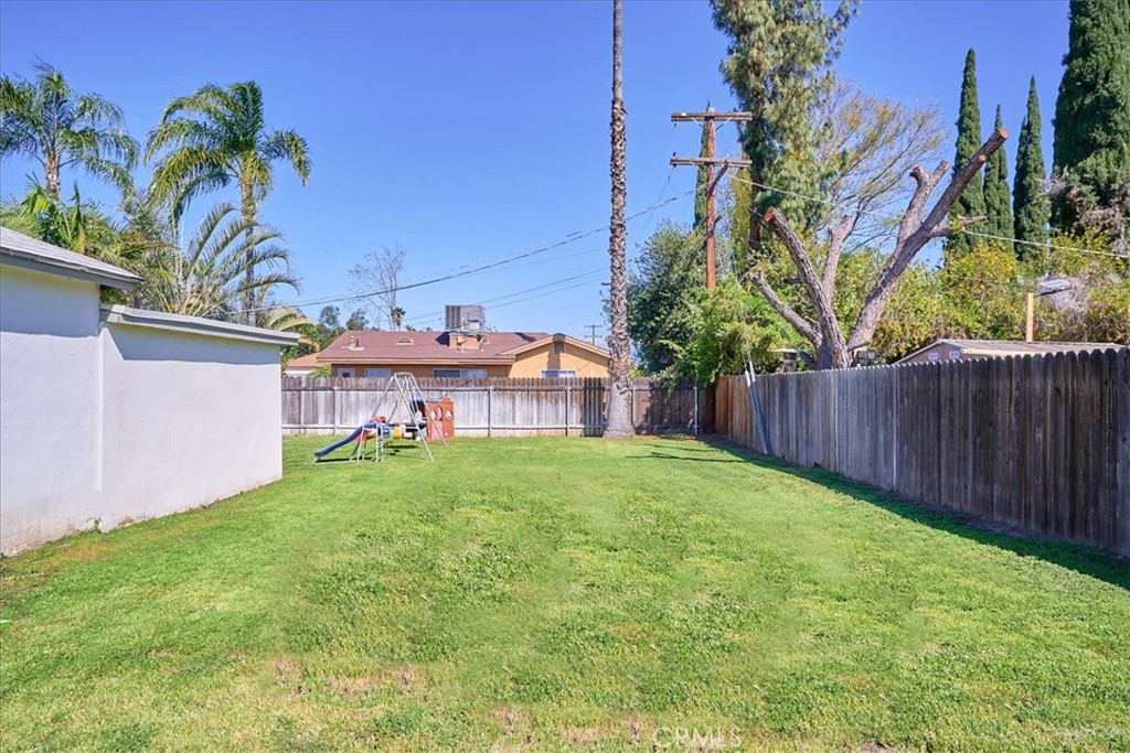3469 Verde Street Riverside, CA 92504 - Photo 33 of 38 a view of a garden with a house