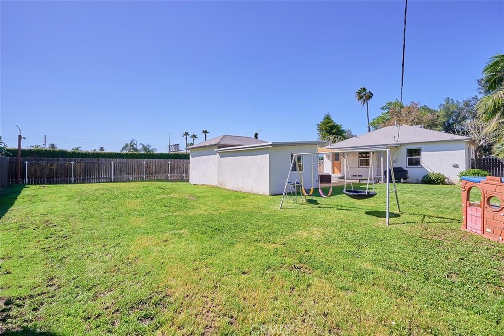3469 Verde Street Riverside, CA 92504 - Photo 34 of 38 a view of a house with backyard and a tree
