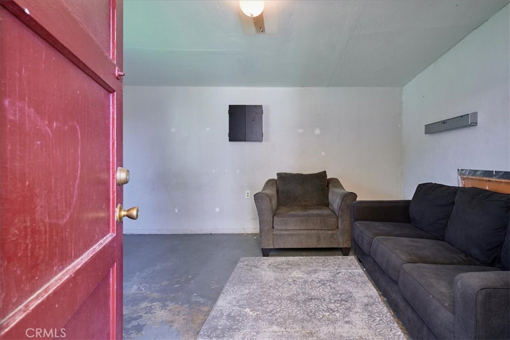 3469 Verde Street Riverside, CA 92504 - Photo 37 of 38 a living room with furniture and a couch