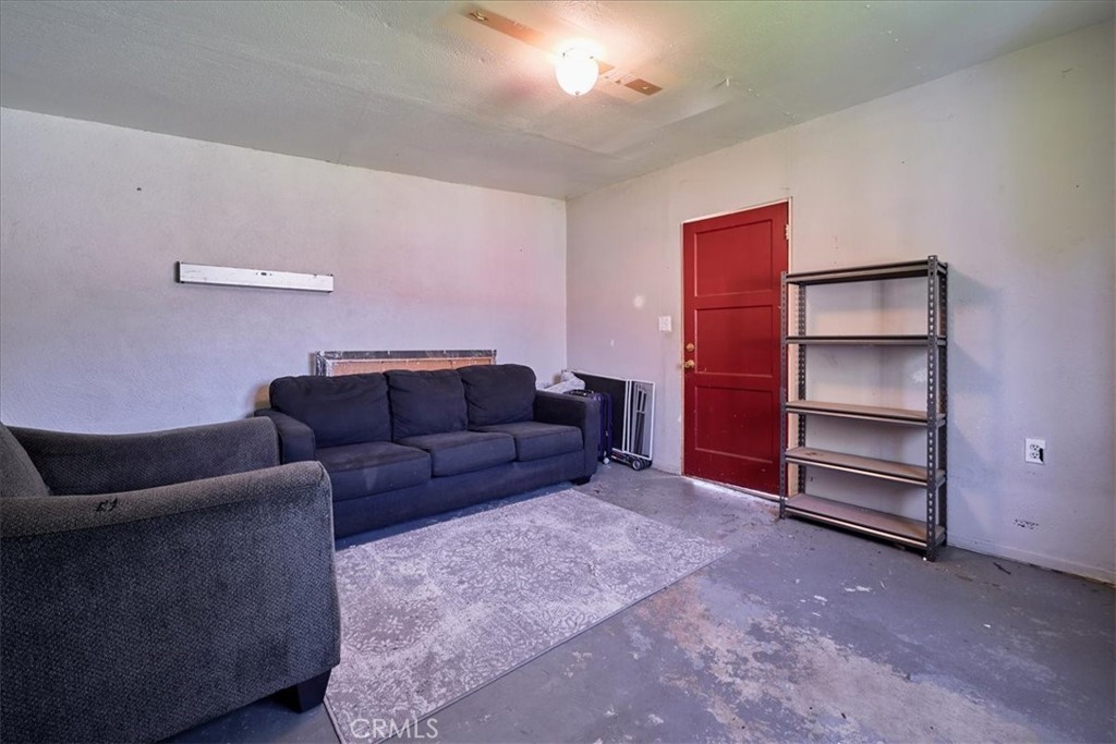3469 Verde Street Riverside, CA 92504 - Photo 38 of 38 a living room with furniture and a ceiling fan
