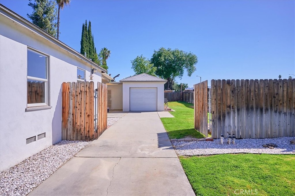 3469 Verde Street Riverside, CA 92504 - Photo 6 of 38 a front view of a house with garden