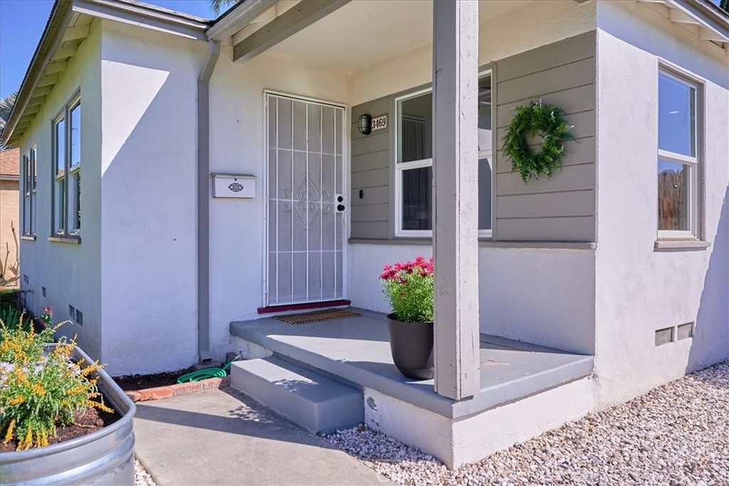 3469 Verde Street Riverside, CA 92504 - Photo 7 of 38 a view of a porch with chairs and potted plants