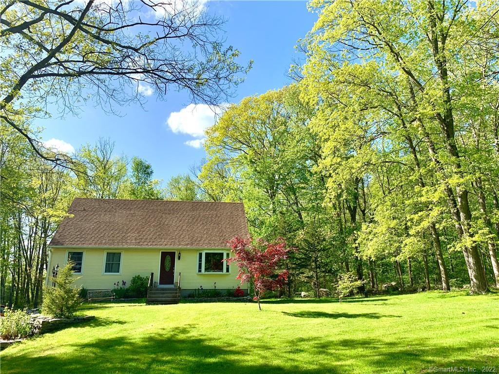 103 Parish Hill Road Windham, CT 06256 - Photo 1 of 1 a front view of house with yard and green space