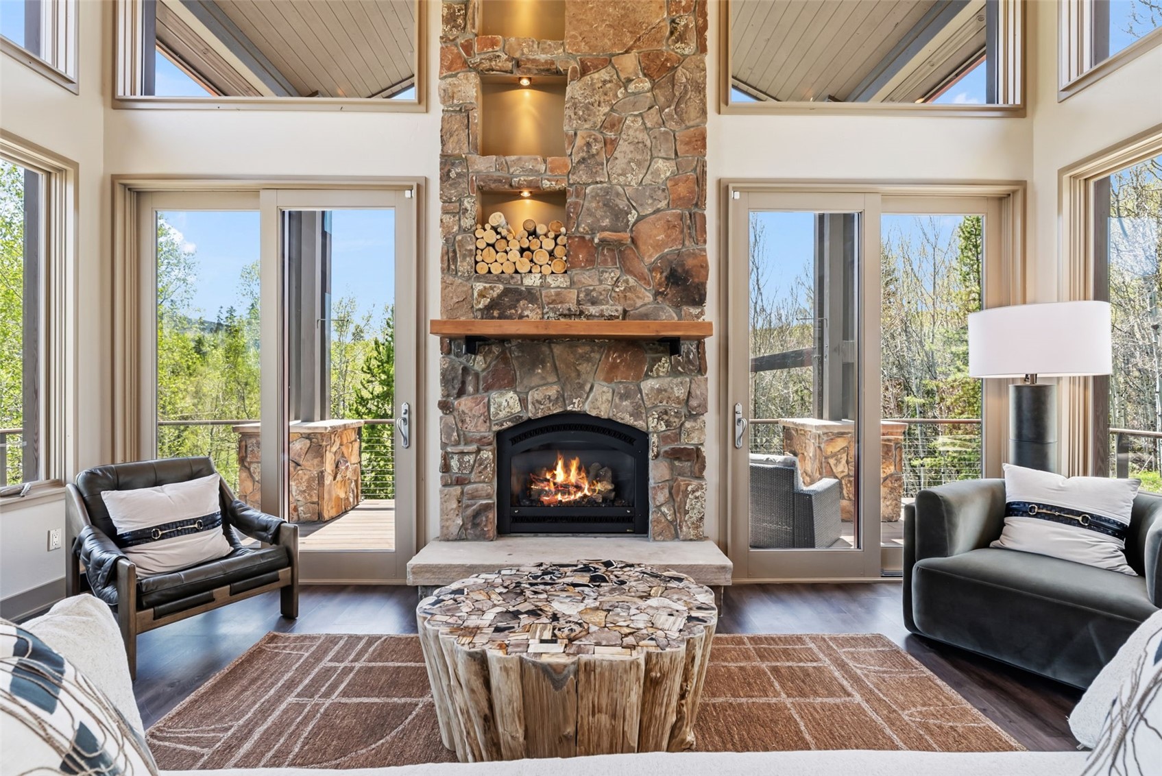 2800 Hunter's Knob Road Silverthorne, CO 80498 - Photo 6 of 37 a living room with furniture and a fireplace
