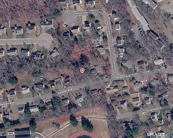 an aerial view of multiple house with outdoor space