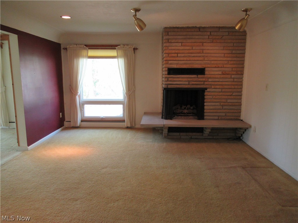 17492 Shurmer Road Strongsville, OH 44136 - Photo 3 of 17 Large Dining Room w/gas fireplace is perfect for big gatherings!