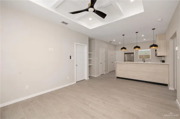 a large white room with kitchen