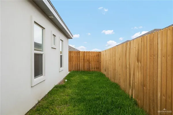 a view of a backyard with garden