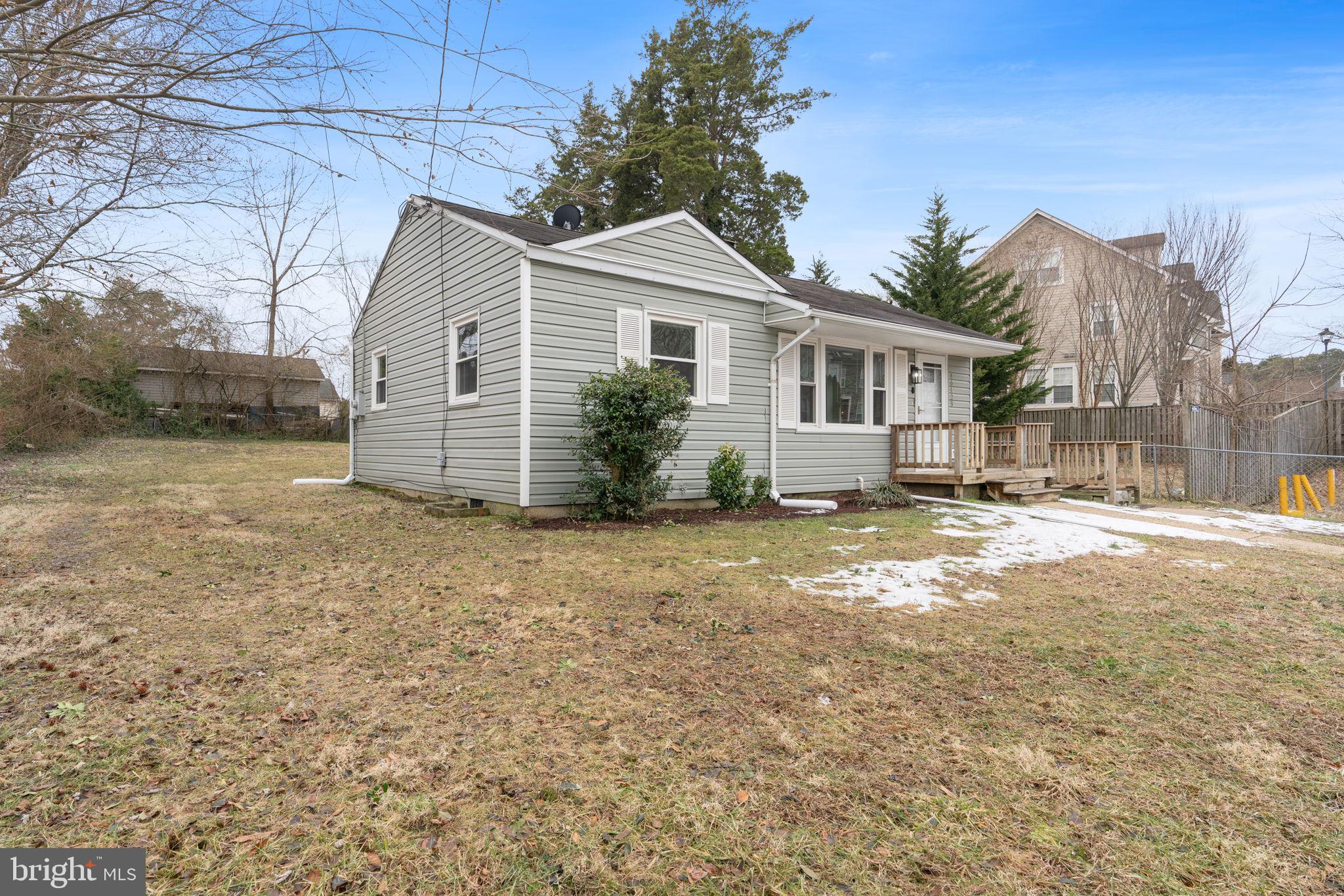 46423 Franklin Road Lexington Park, MD 20653 - Photo 3 of 25 a view of a house with a yard