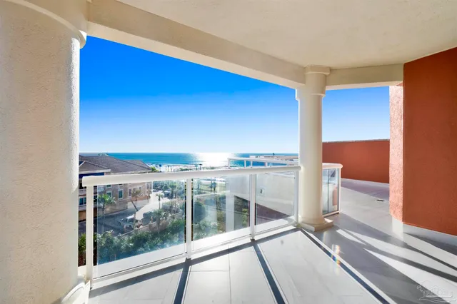 a view of a kitchen from the hallway