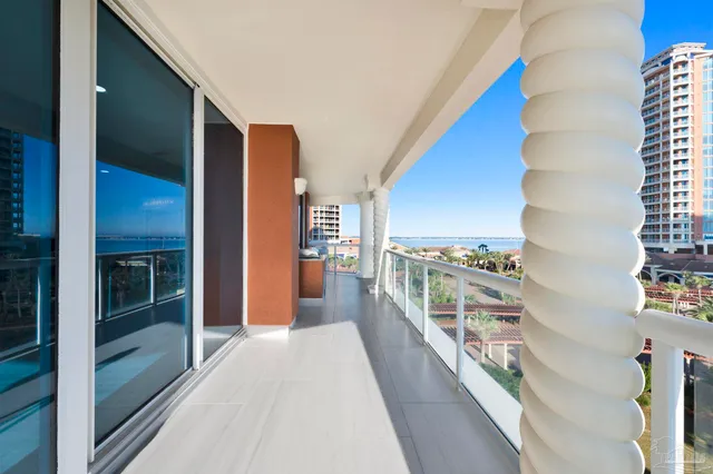 a view of a living room and entry way
