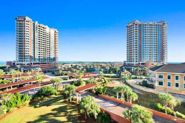 a view of a city with tall buildings