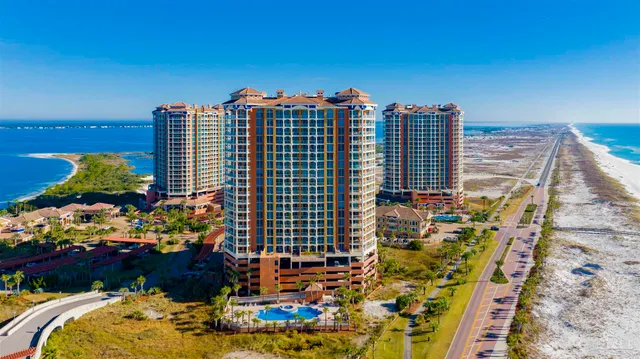 a view of swimming pool with outdoor seating space